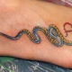Snake tattoo for girls
