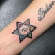 Star of David tattoo: meaning and sketches