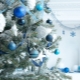 Decorating the Christmas tree in blue-silver color