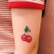 Variants of the image of a cherry for a tattoo