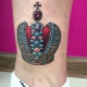 All about the crown tattoo