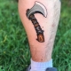 All about the ax tattoo