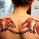 The meaning of a tattoo in the form of a goldfish and options for its execution