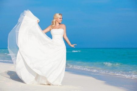 Long wedding dress with a fluffy skirt