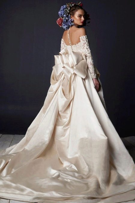 Wedding lush dress with a train and lace top