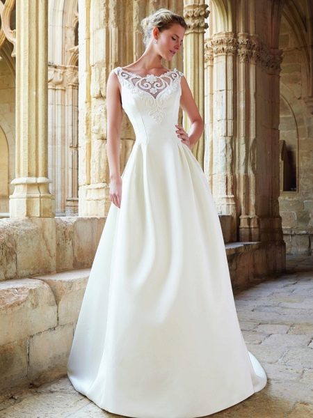 Wedding dress by Raimon Bundo with lace insert