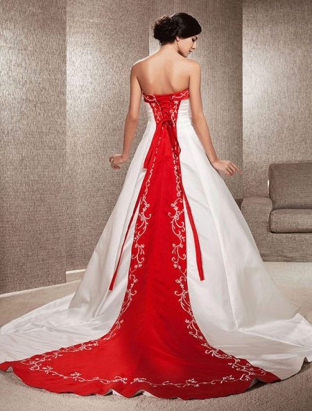 Wedding dress with red element on the back