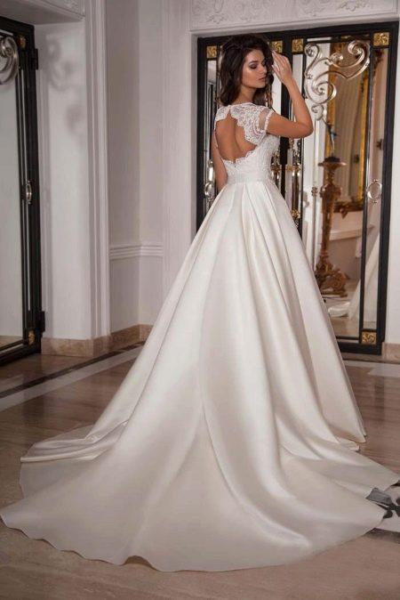 Puffy wedding dress with an open back