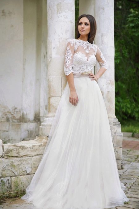 Closed wedding dress with openwork top