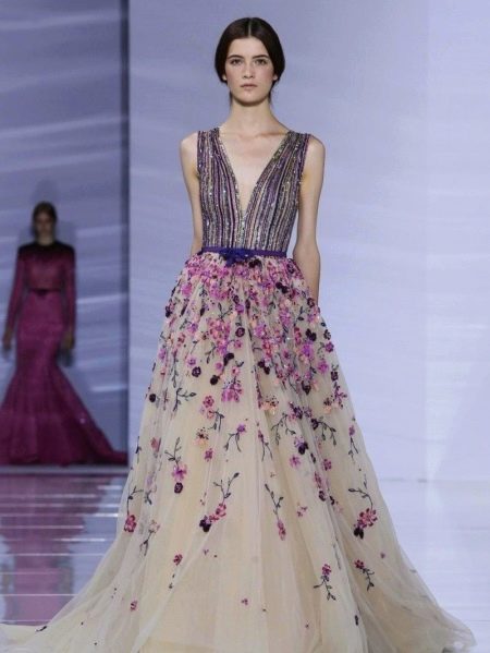 Evening beige dress combined with purple