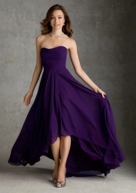 Shoes under a purple evening dress