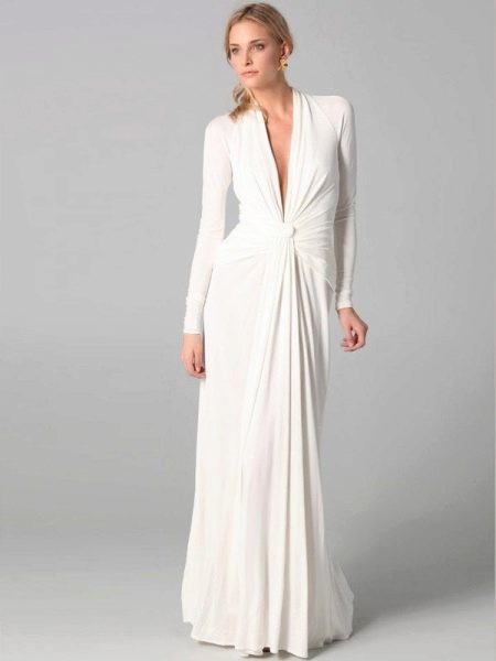 Floor-length evening dress with sleeves and plunging neckline