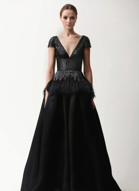 Evening black dress with a deep neckline