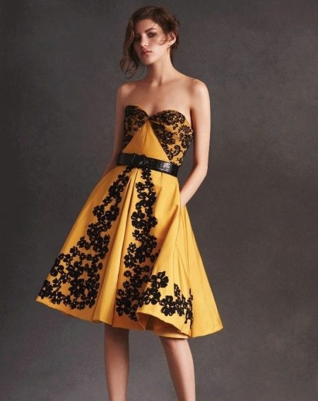 Evening dress with lace inserts