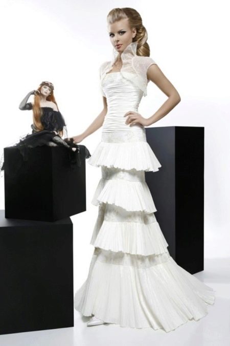 Wedding dress from the Courage collection with a tiered skirt