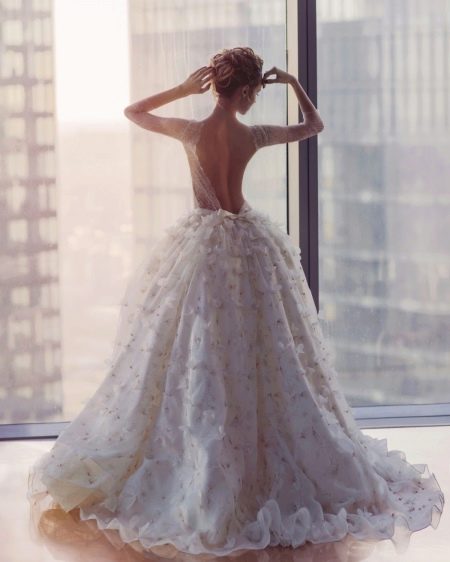 Puffy wedding dress with an open back
