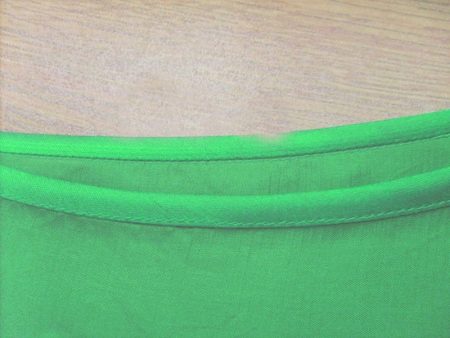 passepoil sur le décolleté