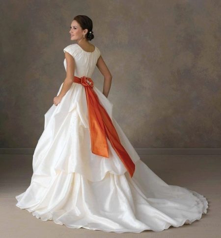 Wedding dress with orange sash