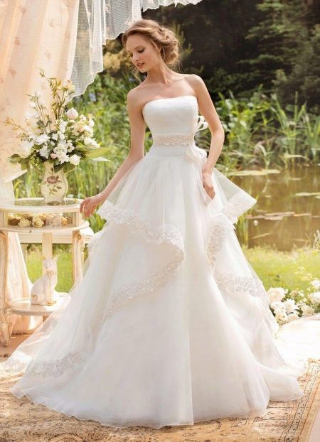 Classic puffy wedding dress with a layered skirt