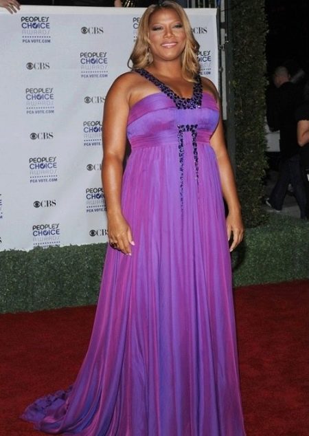 Long dress to the floor of the correct cut hiding the figures of obese women