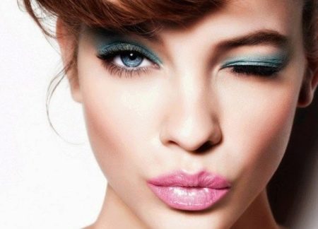 Makeup with pink lipstick under a peach dress