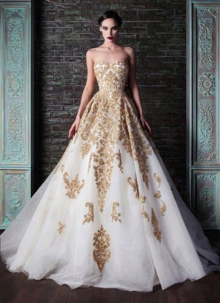 Lush long white dress on the floor with lace
