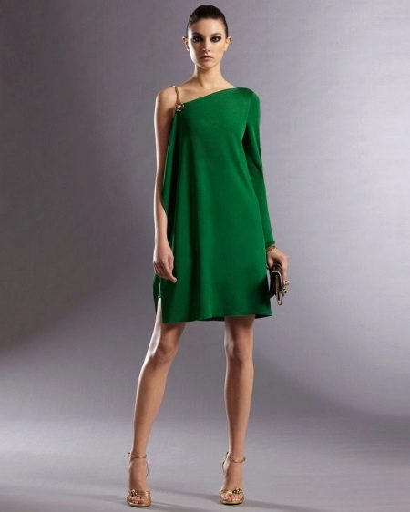 Asymmetrical top of the dress with one long sleeve