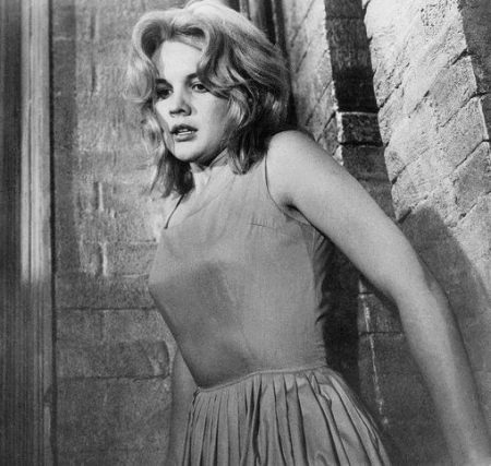 The heroine of the movie Baby Doll 1956 (Doll) in a baby doll dress