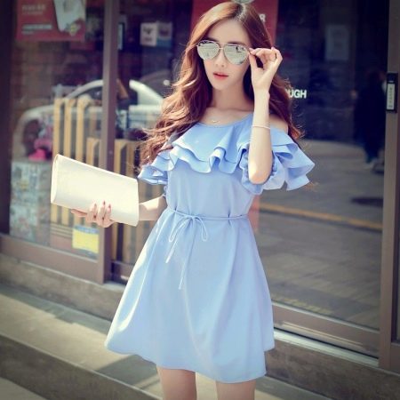 Blue dress with ruffles on the shoulders and chest
