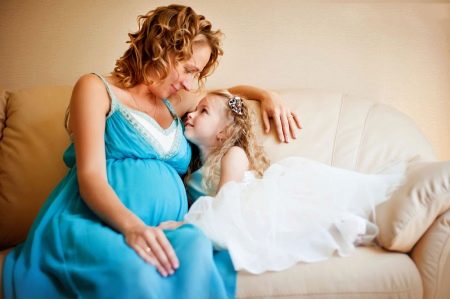 Sleeveless pinafore dress for pregnant woman