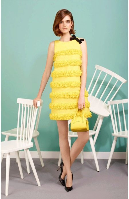 Black shoes for a yellow A-line dress