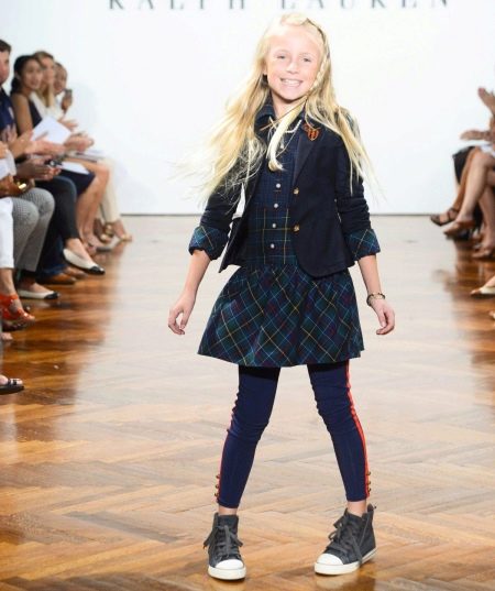 Sneakers under a school dress for girls