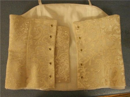 Creating lacing holes on the corset