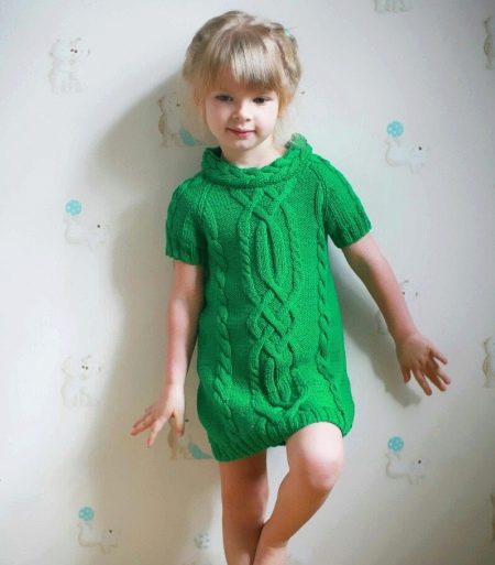 Knitted tunic dress for a girl of 5 years